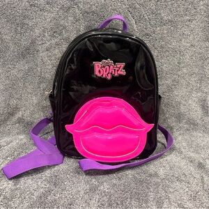 Bratz Black Patent Mini Backpack featuring a prominent pink lips pouch